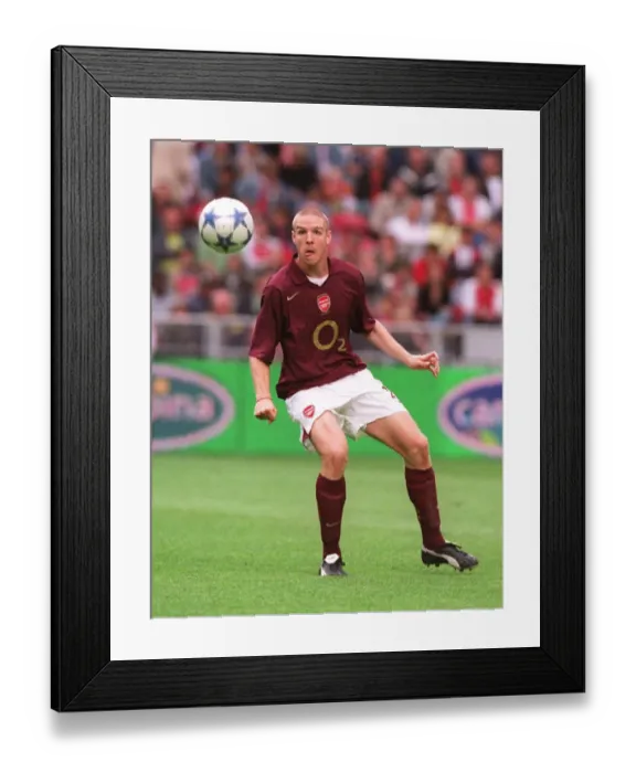 Framed Print : Arsenal's Amsterdam Triumph: Philippe Senderos and the Victory over Porto, 2005