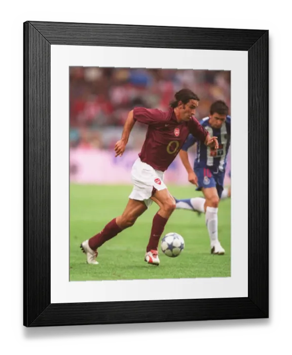 Framed Print : Thrilling Victory: Robert Pires Scores the Winning Goal for Arsenal at Amsterdam Tournament, 2005