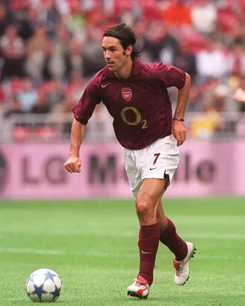 Thrilling Victory: Robert Pires Scores the Winning Goal for Arsenal at the Amsterdam Tournament against Porto, 2005