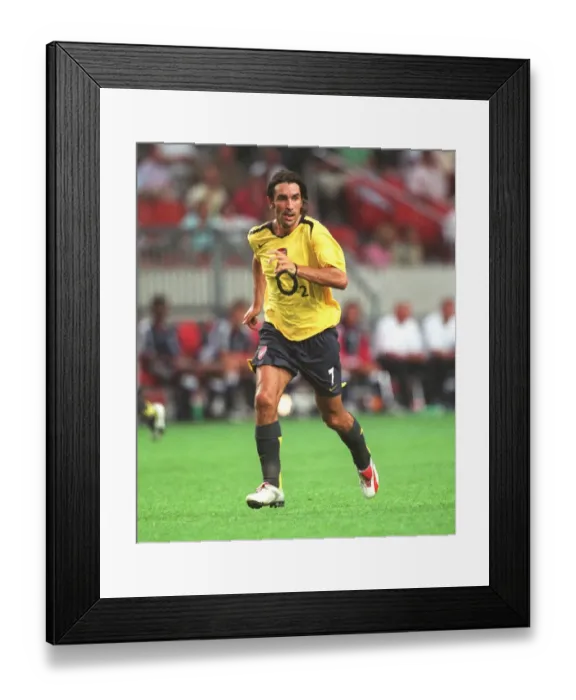 Framed Print : Robert Pires Celebrates Winning Goal: Arsenal's Victory over Ajax in Amsterdam Tournament, 2005