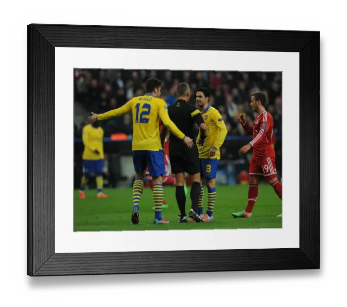 Framed Print : Mikel Arteta Argues with Referee during Tense Bayern Munich vs. Arsenal Champions League Clash