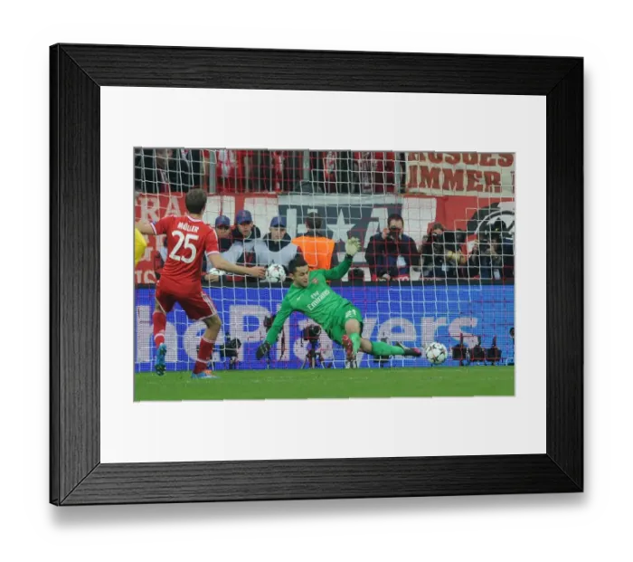 Framed Print : Lukasz Fabianski Saves Thomas Muller's Penalty: Arsenal vs. Bayern Munich, UEFA Champions League 2014