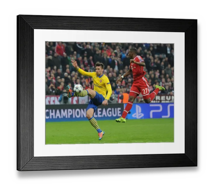 Framed Print : Clash of Titans: Olivier Giroud vs. David Alaba - FC Bayern Munich vs. Arsenal, UEFA Champions League Round of 16