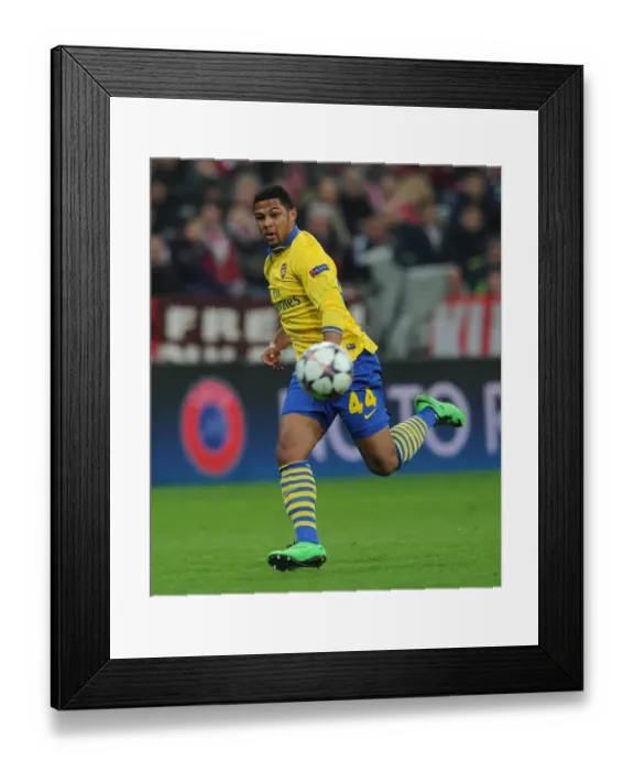 Framed Print : Serge Gnabry: Past Glory in Bayern Munich's Allianz Arena (Arsenal vs FCB, UEFA Champions League 2014)