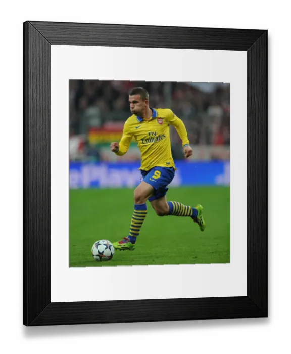 Framed Print : Lukas Podolski: Battle in Munich - Arsenal vs. FC Bayern Munich, UEFA Champions League 2014 Framed Print : Lukas Podolski: Battle in Munich - Arsenal vs. FC Bayern Munich, UEFA Champions League 2014