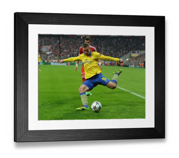 Framed Print : Podolski's Return: A Bayern Munich Legend Haunts Old Team in Champions League Showdown - Arsenal vs. FC Bayern Munich, 2014