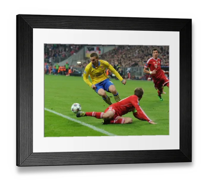 Framed Print : Lukas Podolski's Dramatic Goal: Arsenal vs. Bayern Munich, UEFA Champions League 2013-14 Framed Print : Lukas Podolski's Dramatic Goal: Arsenal vs. Bayern Munich, UEFA Champions League 2013-14