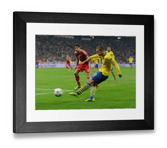Framed Print : Lukas Podolski Stuns Bayern Munich: Dramatic Goal in Champions League Showdown Framed Print : Lukas Podolski Stuns Bayern Munich: Dramatic Goal in Champions League Showdown