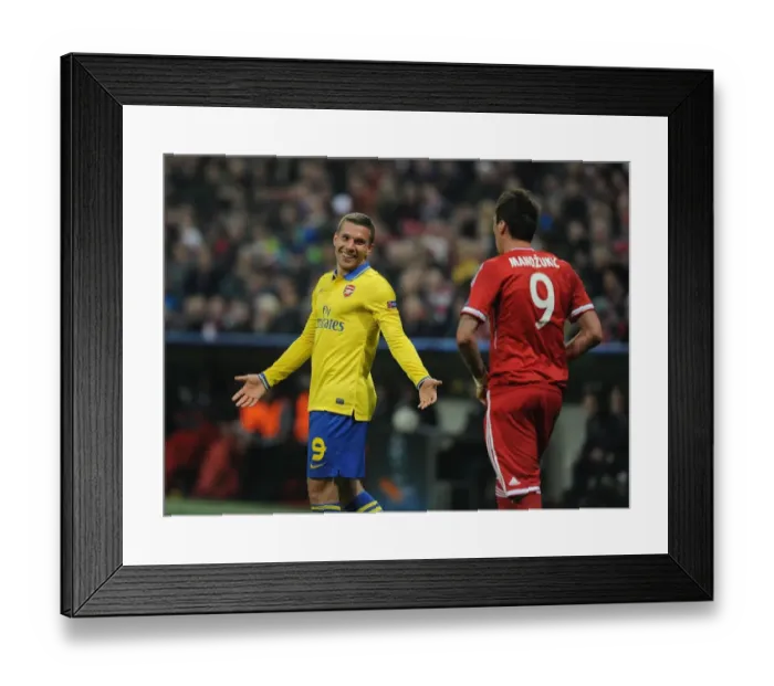 Framed Print : Podolski and Mandzukic Share a Laugh: Bayern Munich vs. Arsenal, UEFA Champions League 2014 Framed Print : Podolski and Mandzukic Share a Laugh: Bayern Munich vs. Arsenal, UEFA Champions League 2014