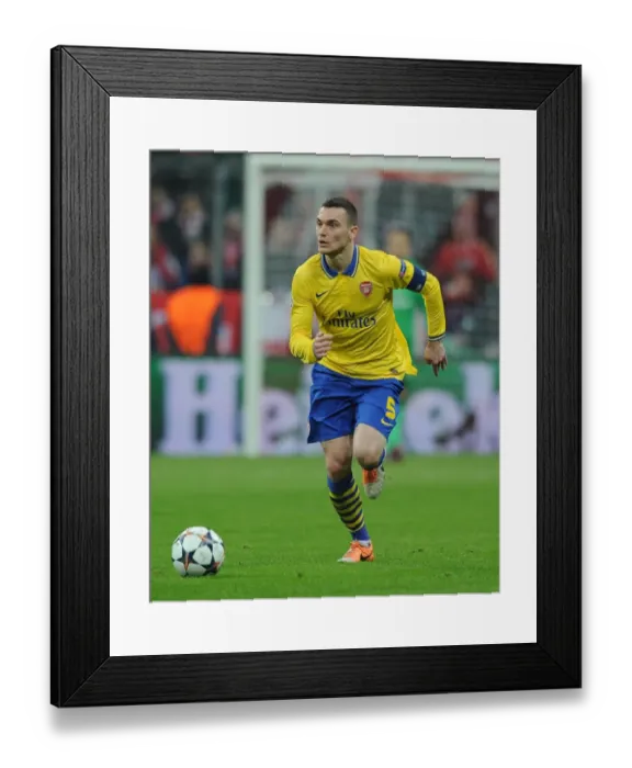 Framed Print : Thomas Vermaelen at Allianz Arena: Arsenal vs. FC Bayern Munich, UEFA Champions League 2013-14