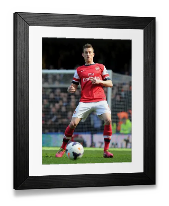 Framed Print : Laurent Koscielny Focused Amidst Chelsea vs Arsenal Rivalry (2013-14)
