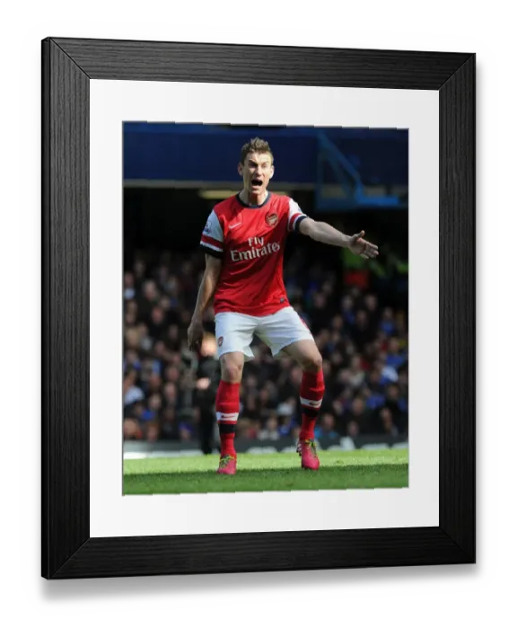 Framed Print : Focused Koscielny Amidst the Intense Chelsea-Arsenal Rivalry (2013-14) Framed Print : Focused Koscielny Amidst the Intense Chelsea-Arsenal Rivalry (2013-14)