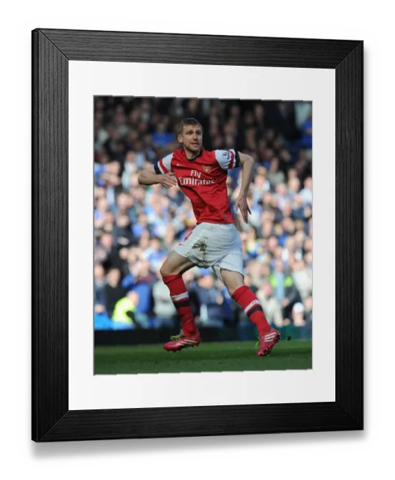Framed Print : Per Mertesacker in Action: Chelsea vs. Arsenal, Premier League 2013-14