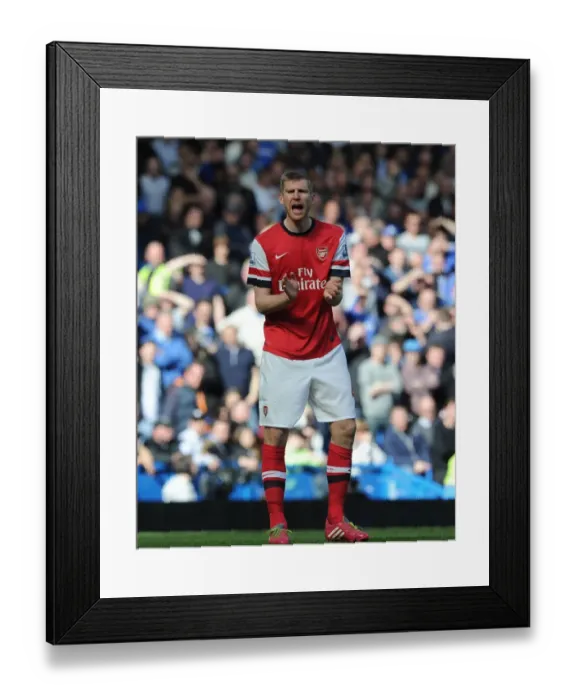 Framed Print : Per Mertesacker in Action: Chelsea vs. Arsenal, Premier League 2013-14 Framed Print : Per Mertesacker in Action: Chelsea vs. Arsenal, Premier League 2013-14