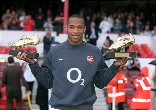 Thierry Henry (Arsenal)with his golden boot awards