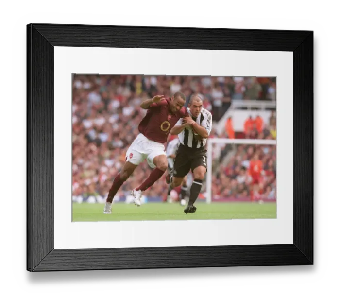 Framed Print : Thierry Henry (Arsenal) Stephen Carr (Newcastle). Arsenal 2: 0 Newcastle United