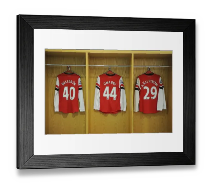 Framed Print : Arsenal Changing Room: Bellerin, Gnabry, and Kallstrom's Jerseys Before Arsenal v Swansea City (2013-14)