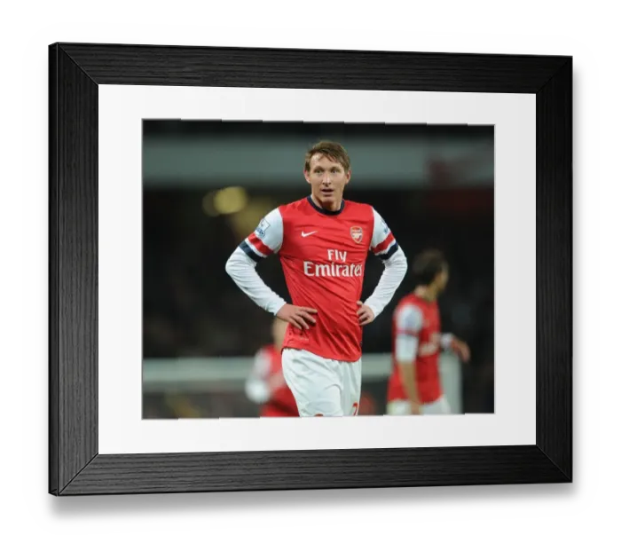 Framed Print : Arsenal's Kim Kallstrom in Action against Swansea City (2014) Framed Print : Arsenal's Kim Kallstrom in Action against Swansea City (2014)