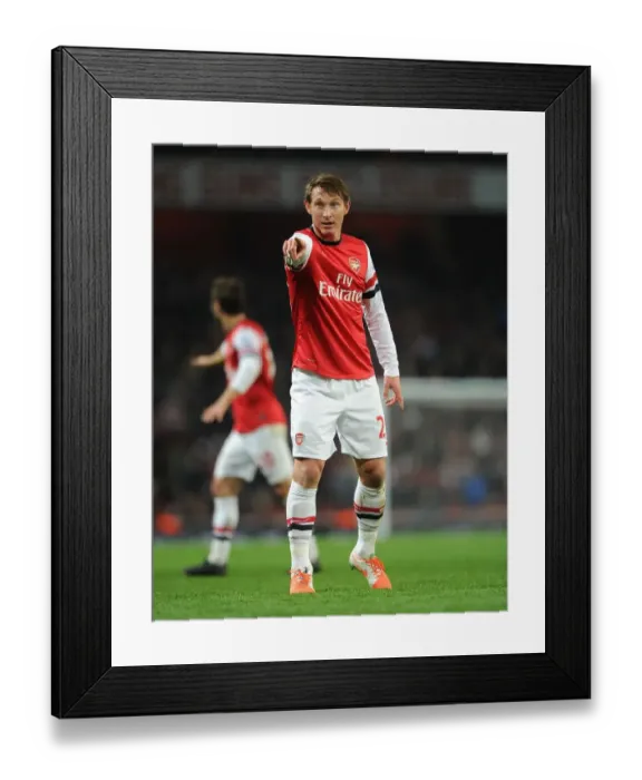 Framed Print : Arsenal's Kim Kallstrom in Action Against Swansea City (2013-14)