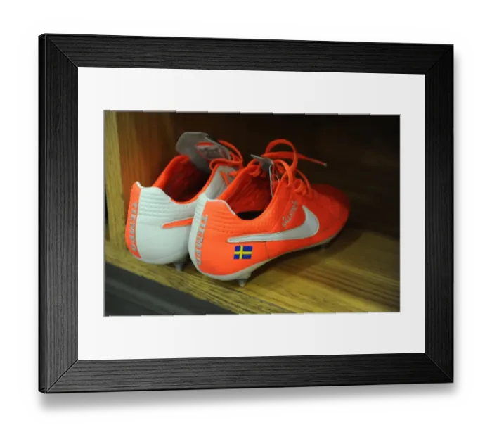 Framed Print : Kim Kallstrom (Arsenal) boots in the changingroom before the match. Arsenal 2: 2 Swansea City