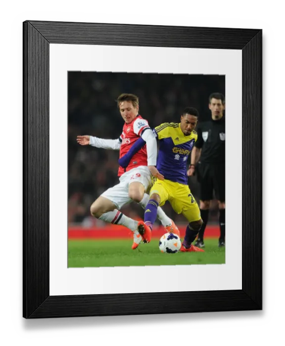 Framed Print : Intense Rivalry: Kallstrom vs. De Guzman - Arsenal vs. Swansea Football Battle Framed Print : Intense Rivalry: Kallstrom vs. De Guzman - Arsenal vs. Swansea Football Battle