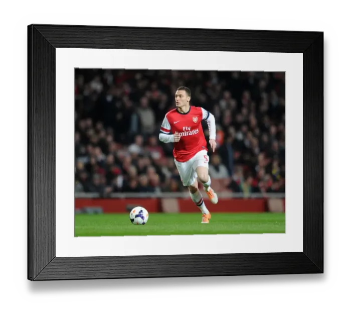 Framed Print : Thomas Vermaelen Focuses in Arsenal's Battle Against Swansea City (2013-14)
