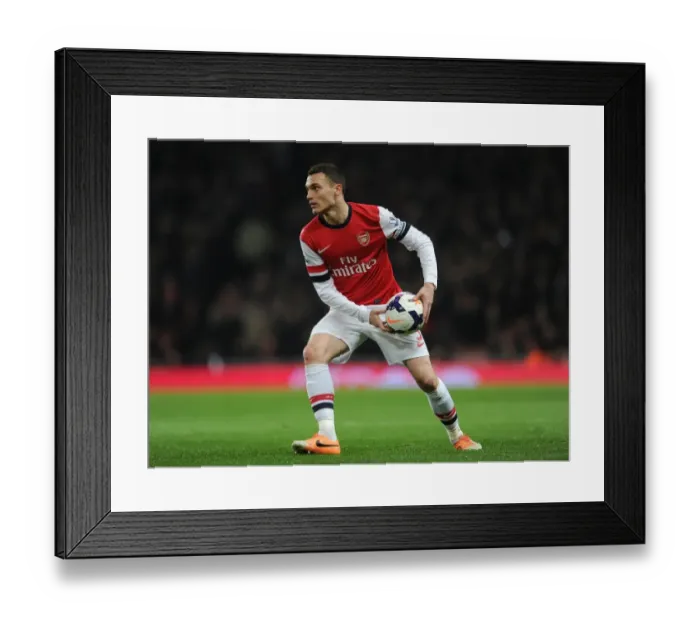 Framed Print : Thomas Vermaelen's Determination: Arsenal's Clash with Swansea City (2013-14)