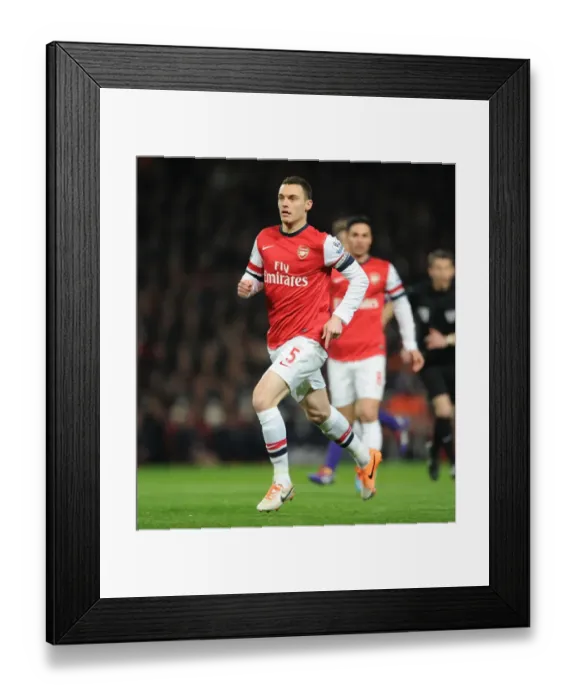 Framed Print : Thomas Vermaelen's Unwavering Determination: Arsenal's Battle Against Swansea City (2013-14)
