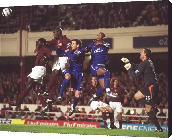 Campbell. Sol Campbell out jumps David Weir and Marcus Bent 