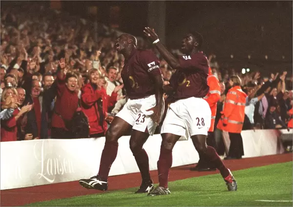 Campbell and Toure Celebrate Arsenal's First Goal: 2-0 Over Everton, FA Premier League, Highbury, 2005