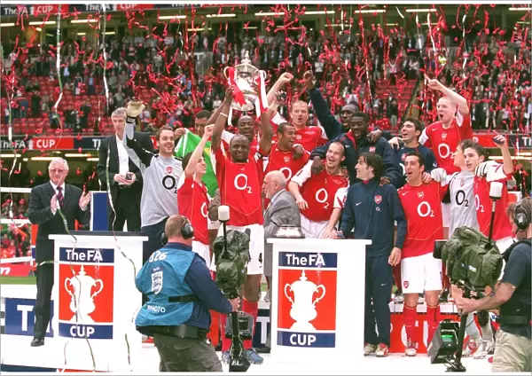 The Arsenal Players celebrate winning the FA Cup Trophy