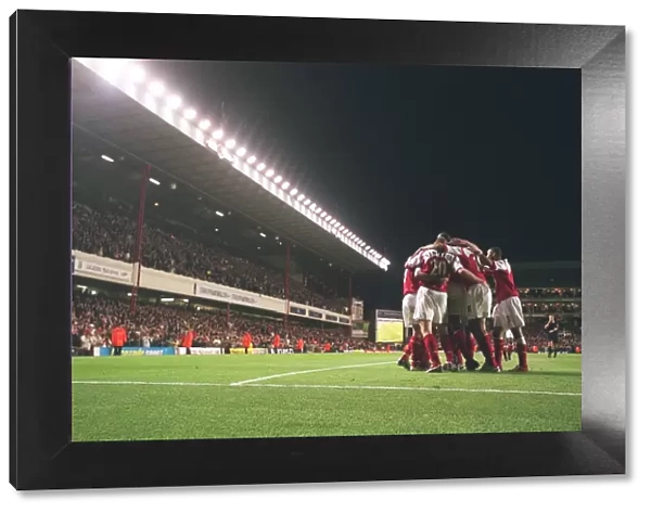 The Arsenal players celebrate Robert Pires 2nd goal in front of the East Stand