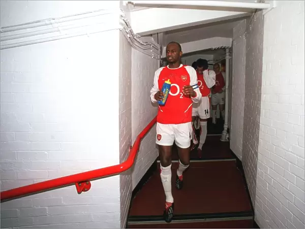 Arsenal captain Patrick Vieira leads the team out for the match