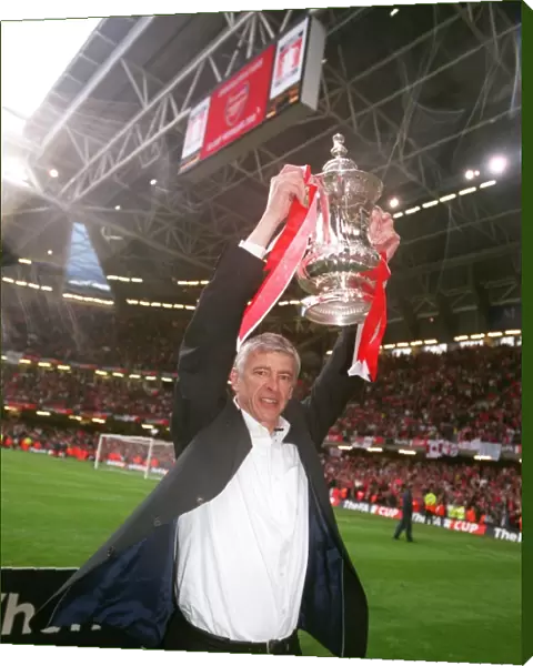 Arsene Wenger the Arsenal Manager with the FA Cup Trophy