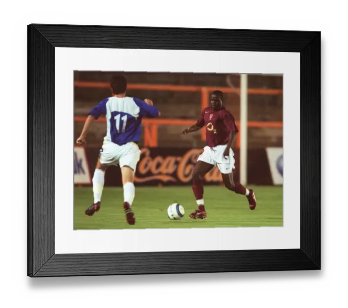 Framed Print : Emmanuel Eboue (Arsenal) Kyle Swane (Portsmouth) Framed Print : Emmanuel Eboue (Arsenal) Kyle Swane (Portsmouth)