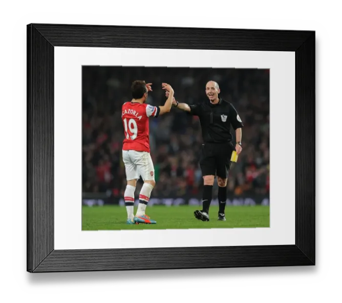 Framed Print : Santi Cazorla and Referee Mike Dean Clash in Arsenal vs Manchester City Premier League Match, 2013 / 14 Framed Print : Santi Cazorla and Referee Mike Dean Clash in Arsenal vs Manchester City Premier League Match, 2013 / 14