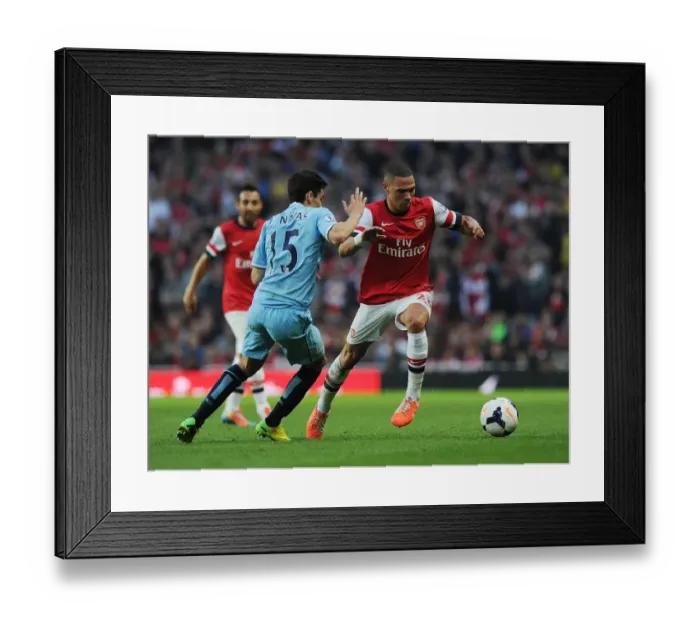 Framed Print : Clash of Wings: Gibbs vs. Navas in Arsenal vs. Manchester City Showdown
