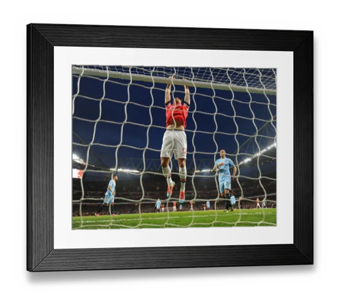 Framed Print : Olivier Giroud (Arsenal). Arsenal 1: 1 Manchester City. Barclays Premier League. Emirates Stadium