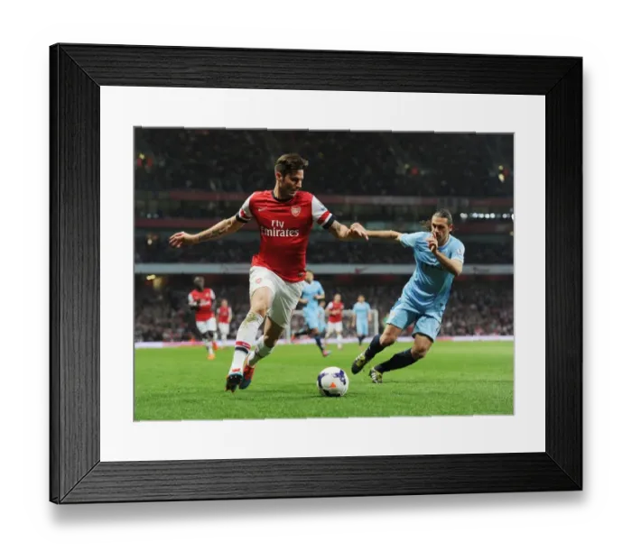 Framed Print : Arsenal's Olivier Giroud Outmaneuvers Manchester City's Martin Demichelis in the 2013 / 14 Premier League Clash