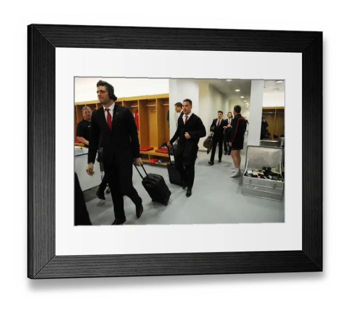Framed Print : Arsenal Teammates Giroud and Podolski in the Changing Room Before Arsenal vs Manchester City (2013 / 14)