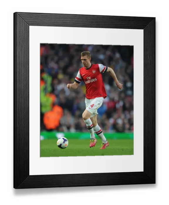 Framed Print : Per Mertesacker in Action: Arsenal vs Manchester City, Premier League 2013 / 14 Framed Print : Per Mertesacker in Action: Arsenal vs Manchester City, Premier League 2013 / 14