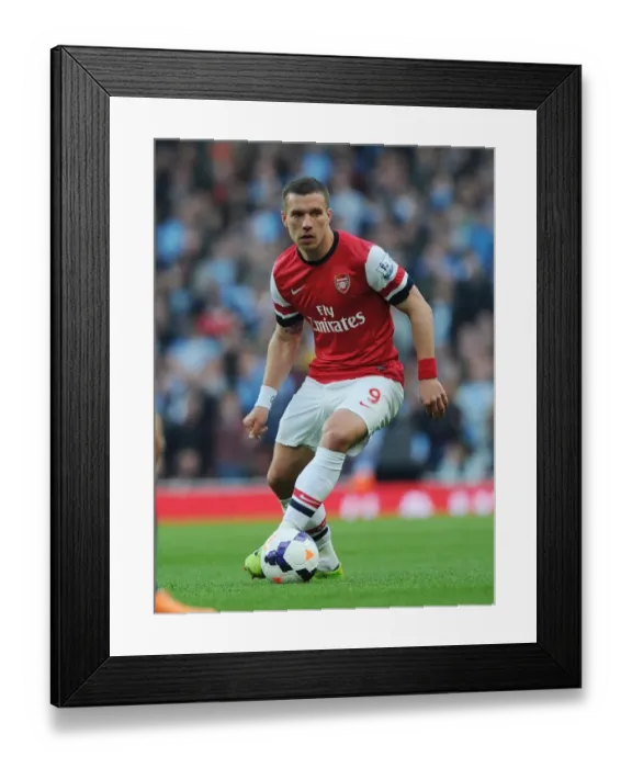 Framed Print : Arsenal vs Manchester City: Lukas Podolski in Action at the Emirates Stadium, Premier League 2013 / 14 Framed Print : Arsenal vs Manchester City: Lukas Podolski in Action at the Emirates Stadium, Premier League 2013 / 14