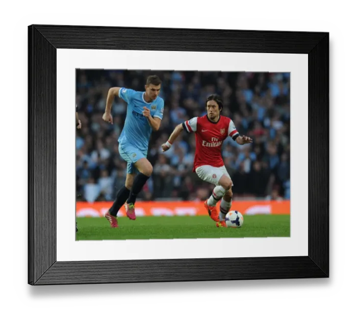 Framed Print : Arsenal's Rosicky Outmaneuvers Manchester City's Dzeko in Thrilling Premier League Clash