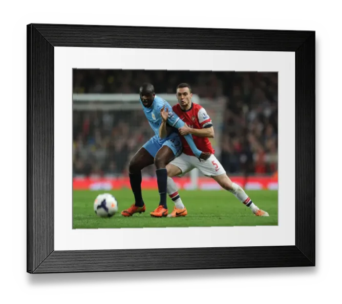 Framed Print : Arsenal vs Manchester City: Vermaelen vs Toure - Premier League Battle