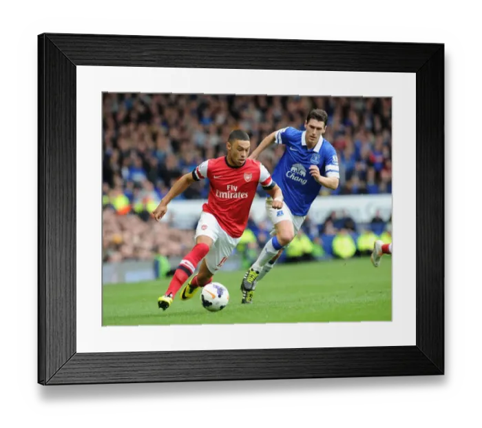 Framed Print : Clash at Goodison Park: Oxlade-Chamberlain vs. Barry