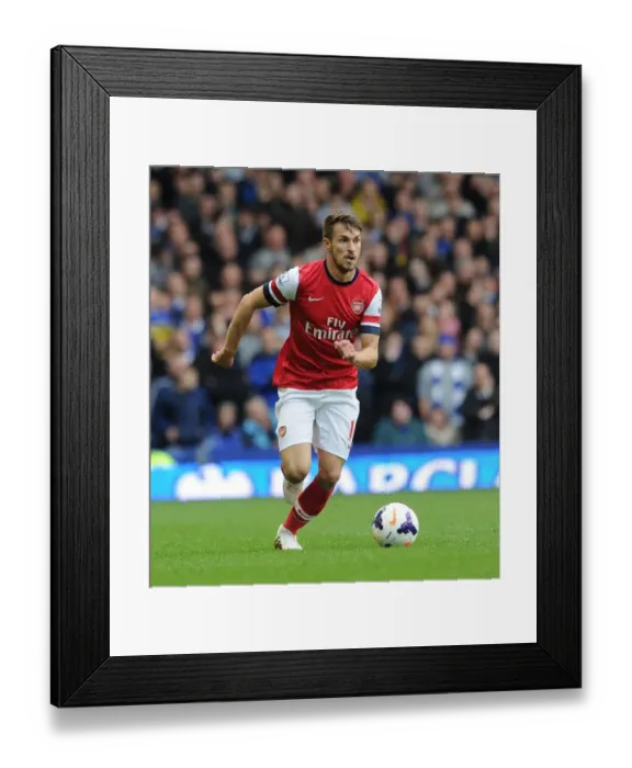 Framed Print : Aaron Ramsey in Action: Everton vs. Arsenal, Premier League 2013 / 14 Framed Print : Aaron Ramsey in Action: Everton vs. Arsenal, Premier League 2013 / 14
