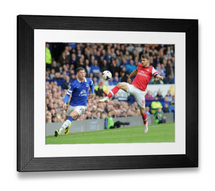 Framed Print : Clash at Goodison Park: Ramsey vs. Barkley in Premier League Showdown
