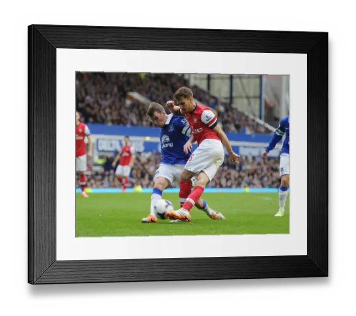 Framed Print : Clash at Goodison Park: Ramsey vs. Coleman in Premier League Showdown Framed Print : Clash at Goodison Park: Ramsey vs. Coleman in Premier League Showdown