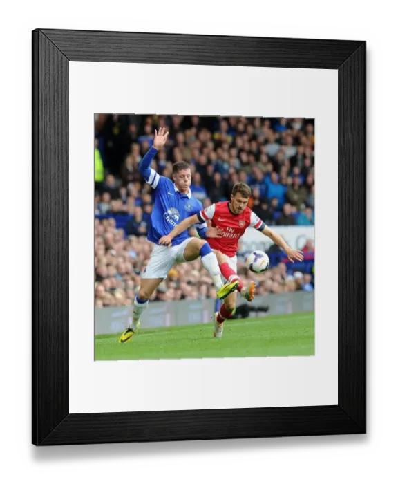 Framed Print : Clash of Midfield Titans: Ramsey vs Barkley in Everton vs Arsenal, Premier League 2013 / 14 Framed Print : Clash of Midfield Titans: Ramsey vs Barkley in Everton vs Arsenal, Premier League 2013 / 14