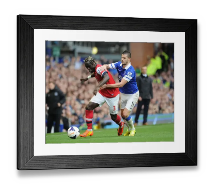 Framed Print : Bacary Sagna vs. Kevin Mirallas: Intense Battle at Goodison Park (Everton vs. Arsenal, Premier League, 2013 / 14) Framed Print : Bacary Sagna vs. Kevin Mirallas: Intense Battle at Goodison Park (Everton vs. Arsenal, Premier League, 2013 / 14)